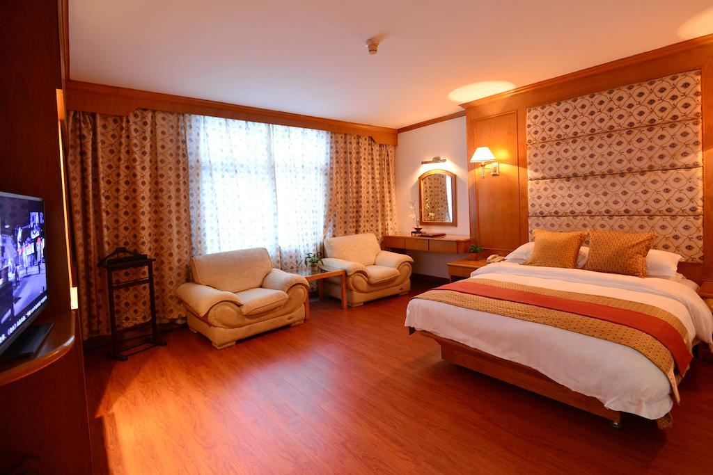 Baodao Exhibition Center Hotel Вуишан Стая снимка